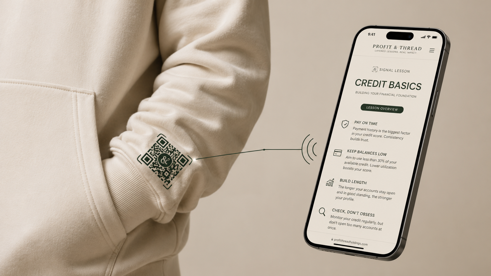 Cream First Signal hoodie QR code connecting to a Profit & Thread credit basics lesson on a smartphone.